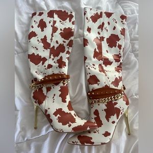 Cow print, high heeled boots!
